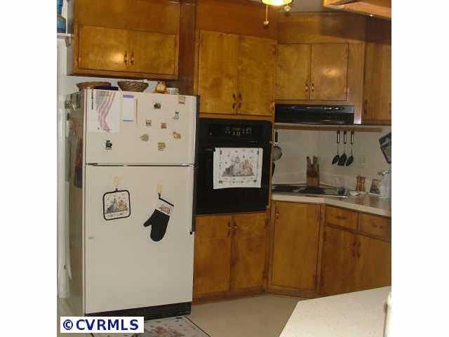 11512 Ridge Road Hopewell, VA 23860 - Photo 5 of 8 Other - Drop in stove and built in over - no more bending over to take that turkey out of the over.