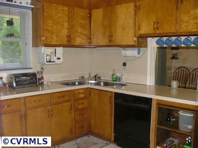 11512 Ridge Road Hopewell, VA 23860 - Photo 6 of 8 Other - Lots of cabinets and a corner sink.