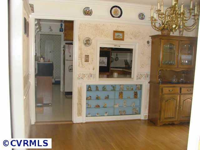 11512 Ridge Road Hopewell, VA 23860 - Photo 7 of 8 Other - Hardwood floors in Dining Room, pass through from kitchen and sliding glass doors to patio.