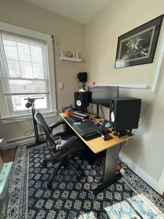 a workspace with furniture and window