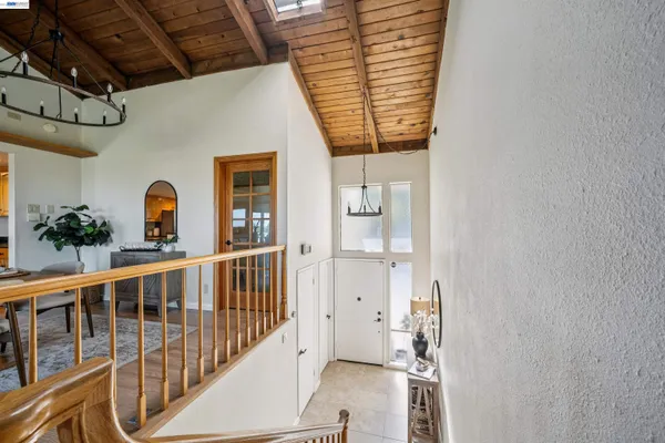 a view of porch with wooden door