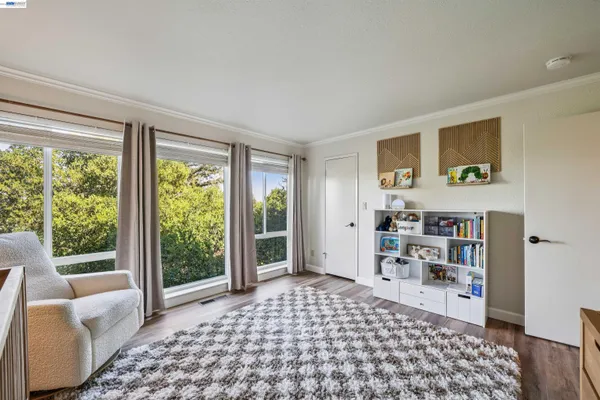 a room with a couch and a window