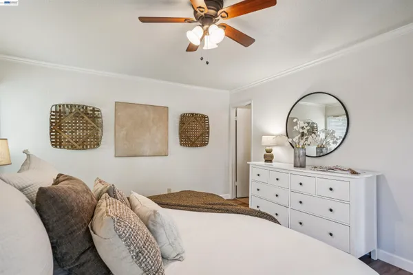 a bedroom with a bed and a closet