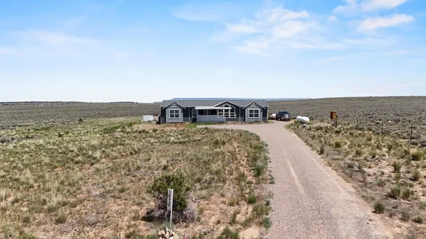 a view of swimming pool with a yard