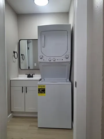 a utility room with washer and dryer