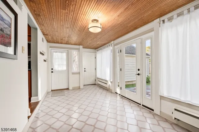 a view of a hallway with closet area