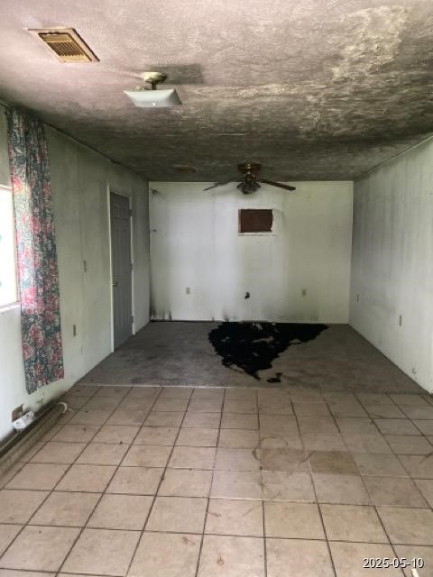 201 West Oak Daisetta, TX 77533 - Photo 3 of 6 an empty room with natural light