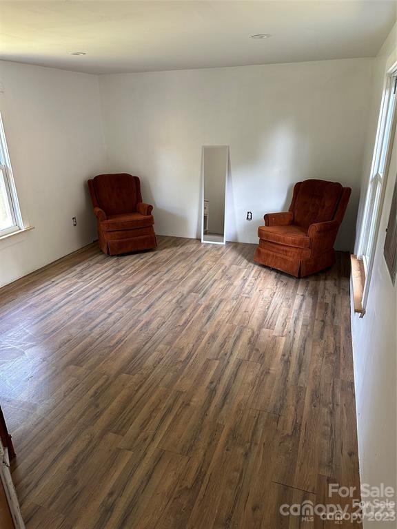 1385 Rock Spring Road Mill Spring, NC 28756 - Photo 14 of 15 a bedroom with a bed and a dresser