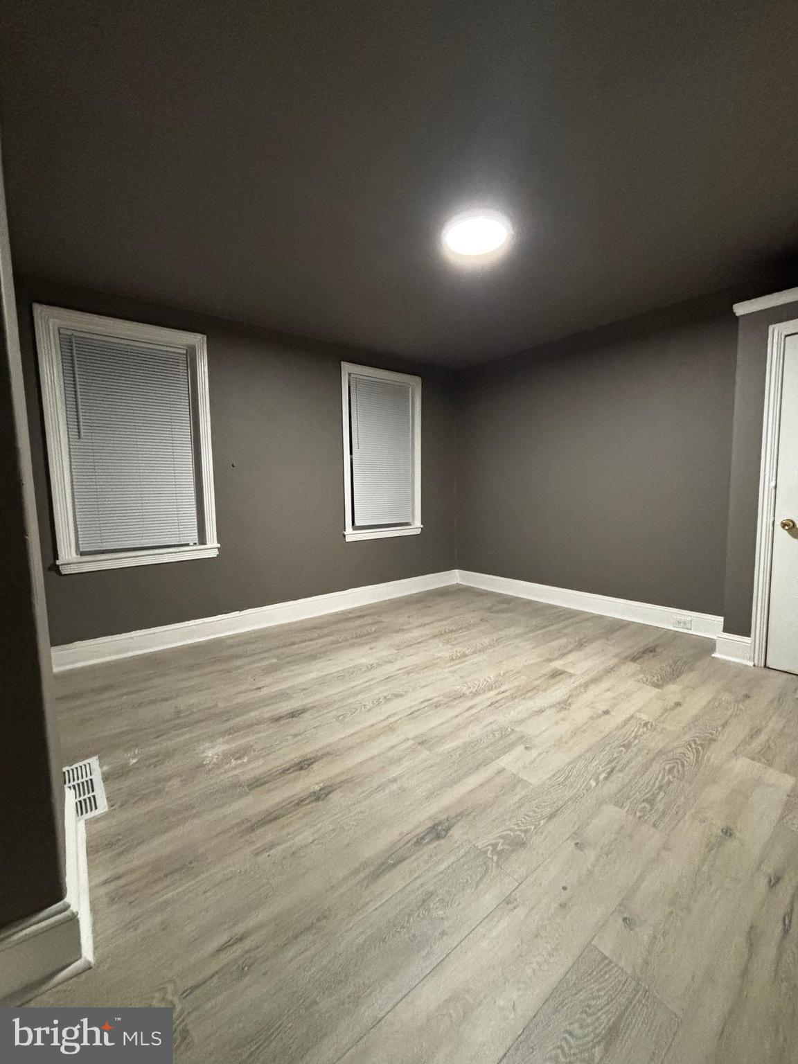 2116 East Cambria Street Philadelphia, PA 19134 - Photo 5 of 9 a view of empty room with wooden floor