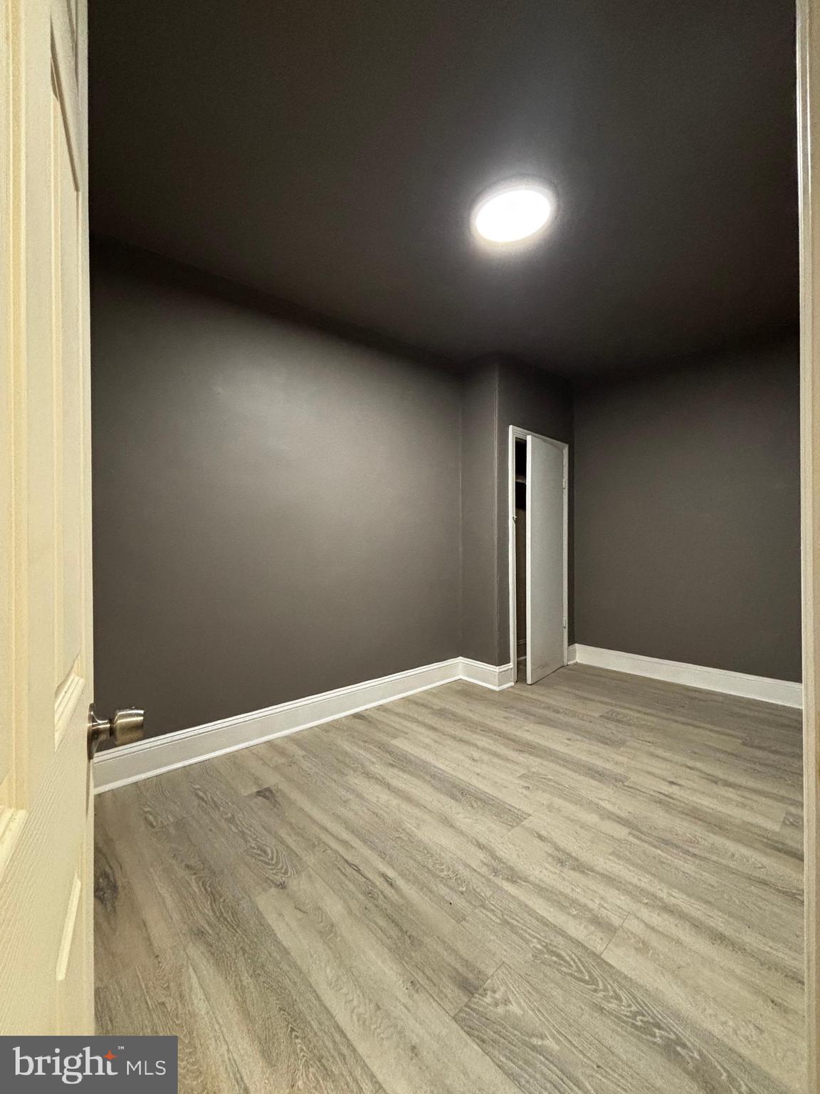 2116 East Cambria Street Philadelphia, PA 19134 - Photo 6 of 9 a view of an empty room with wooden floor
