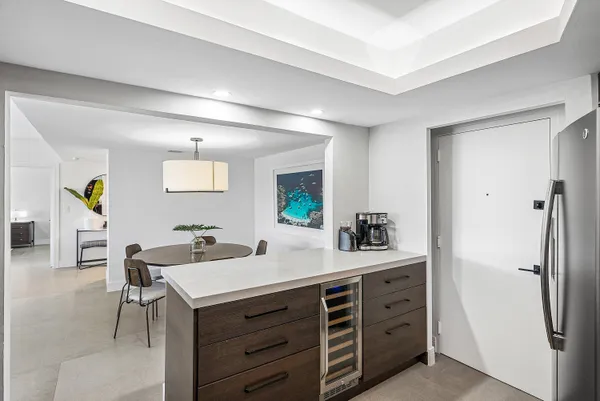 a room with a table and chairs