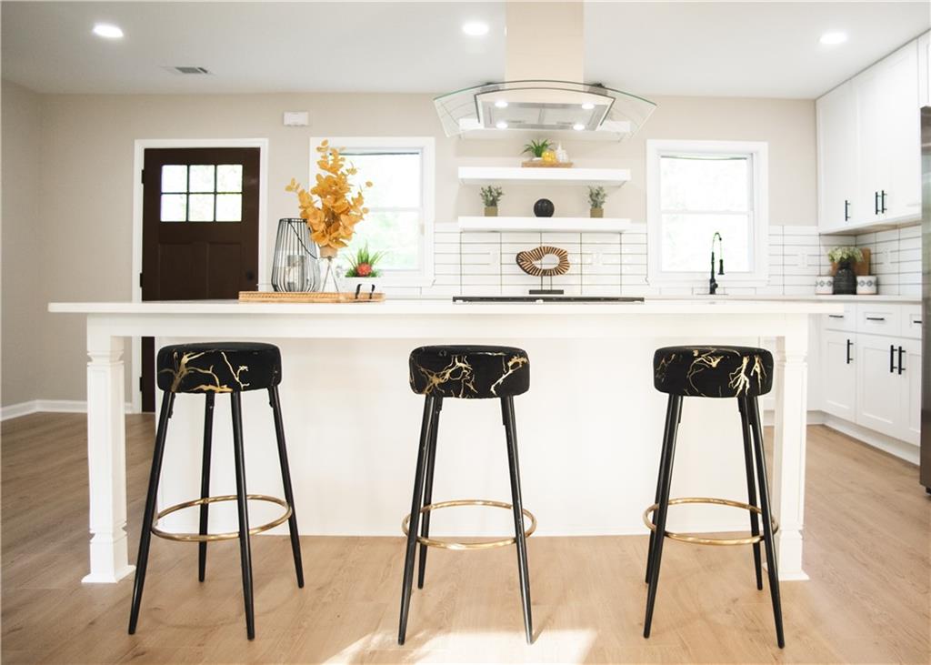 3561 Misty Valley Road Decatur, GA 30032 - Photo 16 of 56 a kitchen with appliances cabinets and chair