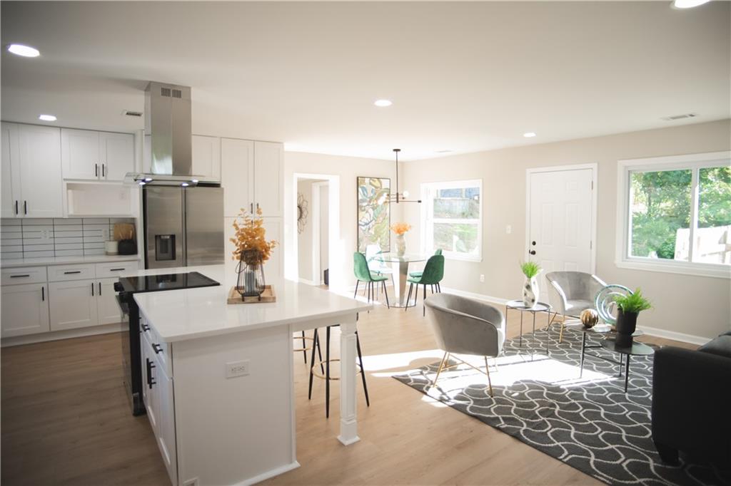 3561 Misty Valley Road Decatur, GA 30032 - Photo 19 of 56 a view of a dining room with furniture