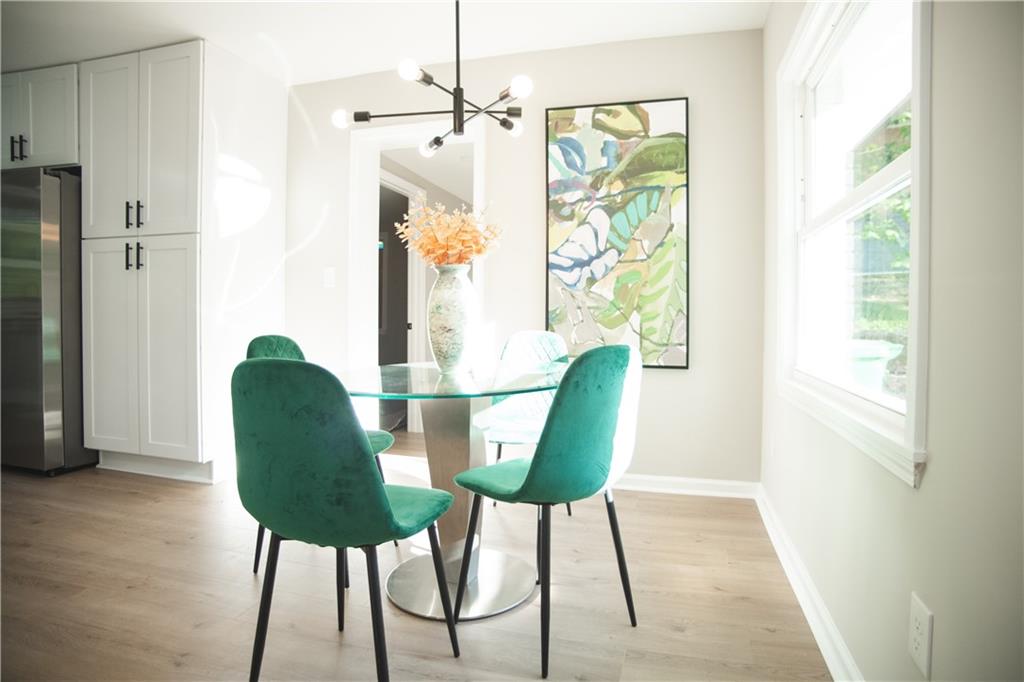 3561 Misty Valley Road Decatur, GA 30032 - Photo 28 of 56 a view of a chair and table in a room