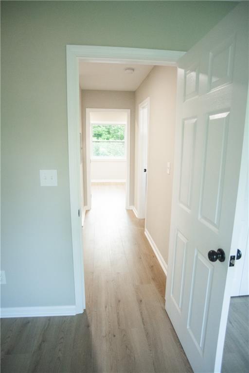 3561 Misty Valley Road Decatur, GA 30032 - Photo 3 of 56 a view of a hallway with wooden floor