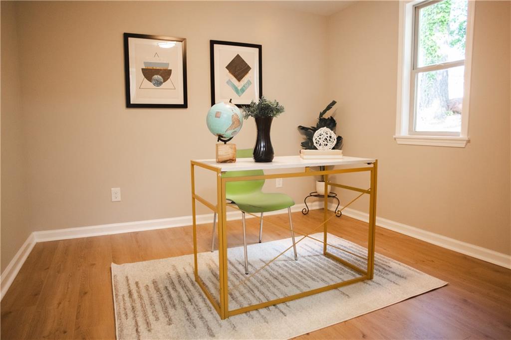 3561 Misty Valley Road Decatur, GA 30032 - Photo 36 of 56 a view of a room that has a table and chair