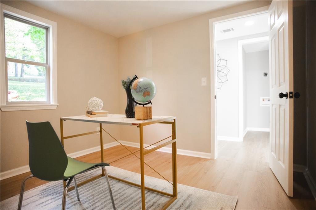 3561 Misty Valley Road Decatur, GA 30032 - Photo 37 of 56 a view of a livingroom with furniture and wooden floor
