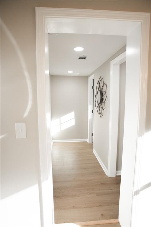 3561 Misty Valley Road Decatur, GA 30032 - Photo 45 of 56 a view of a hallway with wooden floor