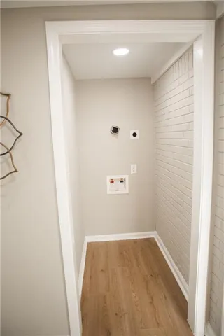 a bedroom with a bed and a mirror