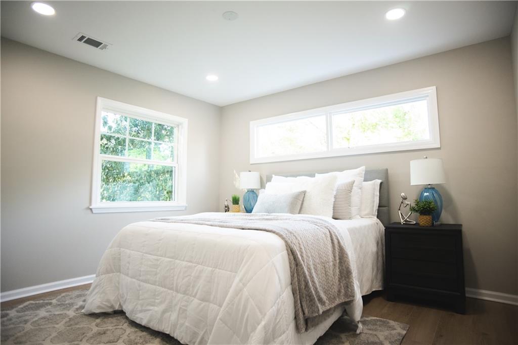 3561 Misty Valley Road Decatur, GA 30032 - Photo 49 of 56 a bedroom with a bed and window