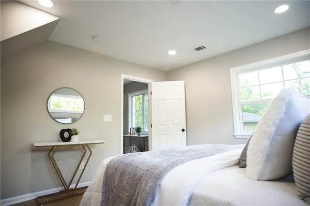 an empty room with wooden floor