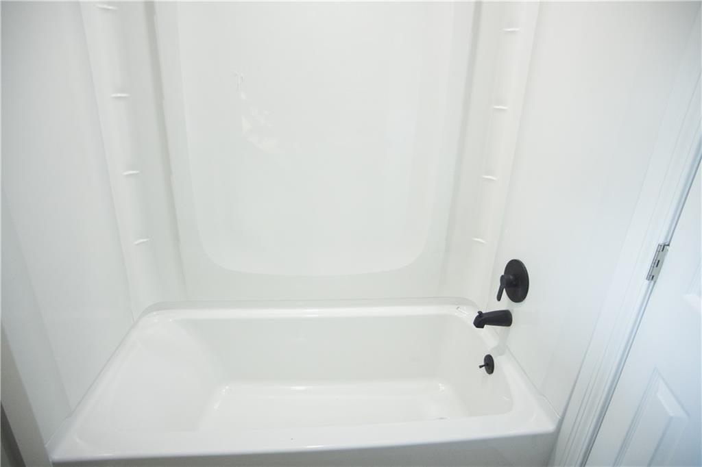 3561 Misty Valley Road Decatur, GA 30032 - Photo 9 of 56 a bathroom with a tub