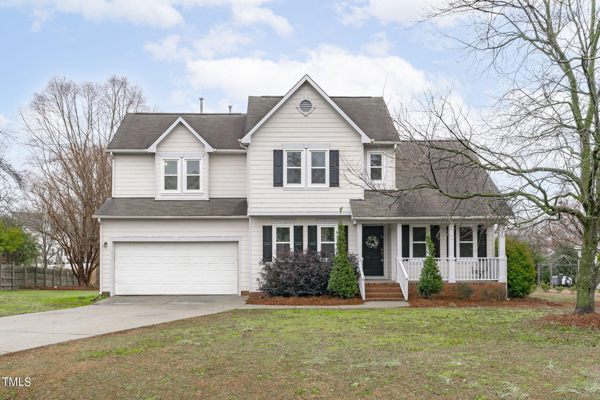2804 Doves Nest Court Fuquay-Varina, NC 27526 - Photo 1 of 2 front view of a house with a yard