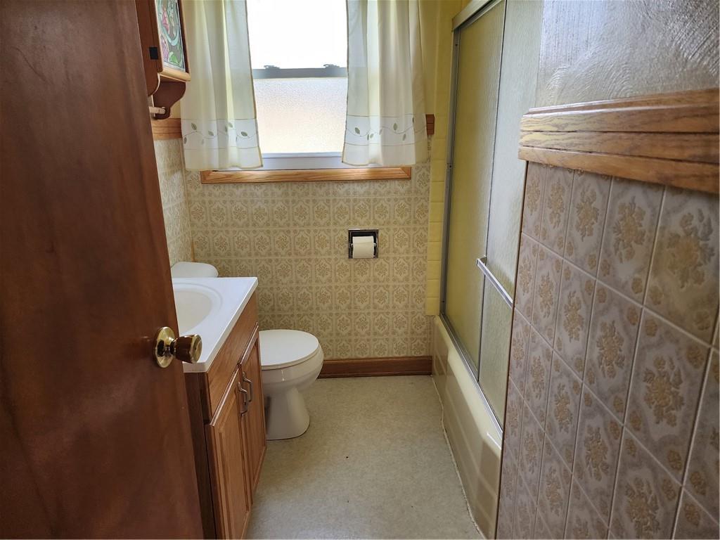 3732 North Balsiger Road Vandergrift, PA 15690 - Photo 21 of 49 a white toilet sitting in front of a bathroom