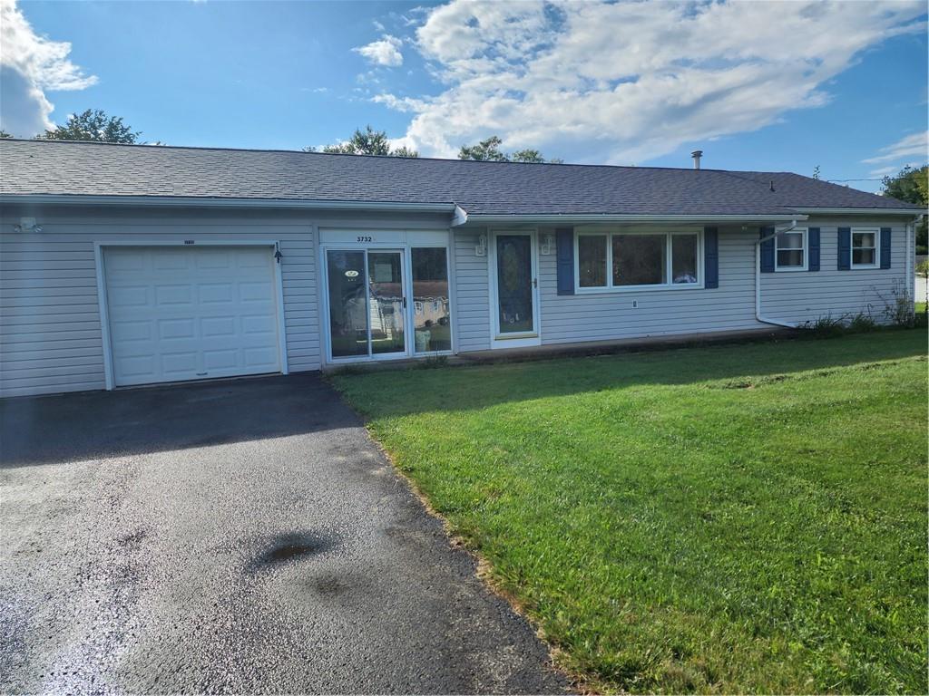 3732 North Balsiger Road Vandergrift, PA 15690 - Photo 3 of 49 a view of a yard in front of a house
