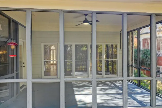 a view of a house with a large window