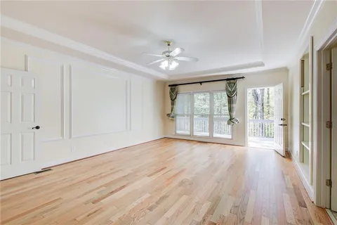 a large kitchen with stainless steel appliances kitchen island granite countertop a refrigerator and a stove top oven