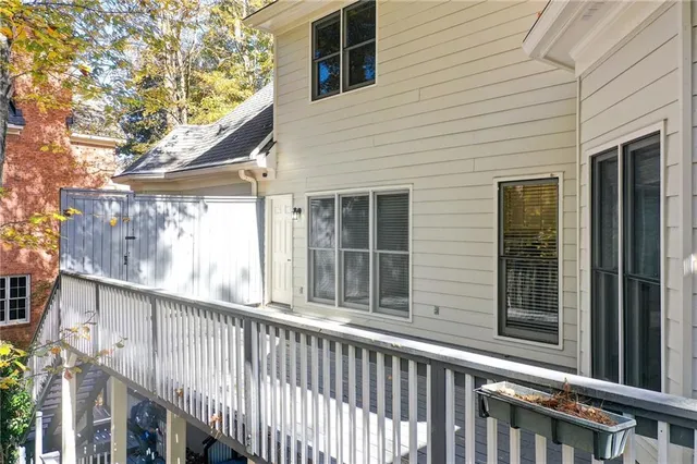 a kitchen with stainless steel appliances granite countertop a sink and a refrigerator