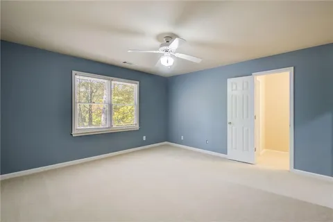 a view of porch with wooden floor