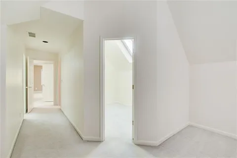 a view of a house with wooden stairs