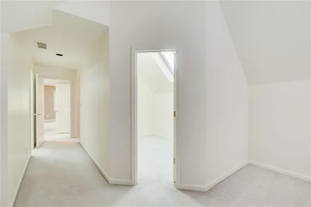 a view of a house with wooden stairs