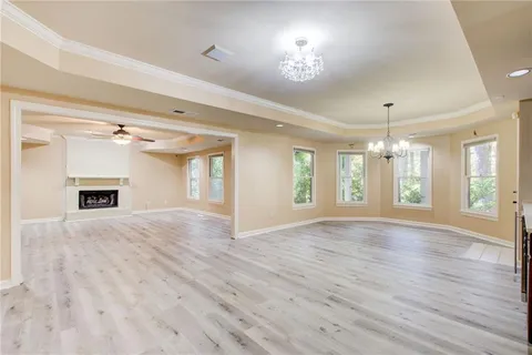 a view of a patio with swimming pool table and chairs