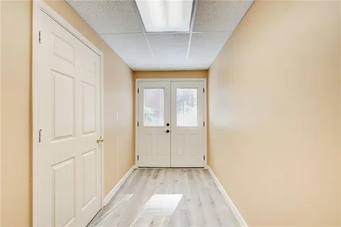 an aerial view of residential house with outdoor space and parking