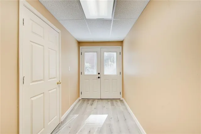 an aerial view of residential house with outdoor space and parking
