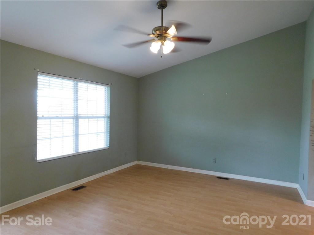 5510 Wolf Pond Road Monroe, NC 28112 - Photo 8 of 16 a view of a room with a window