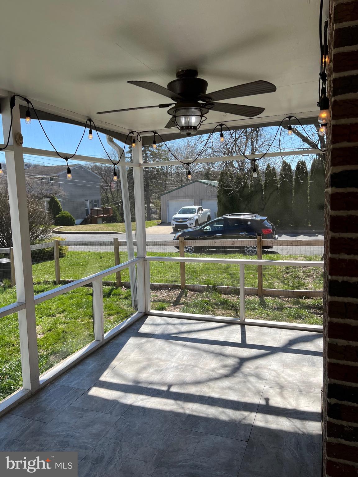 411 Parkside Avenue Reading, PA 19607 - Photo 5 of 19 Screened back
Porch with Edison lights