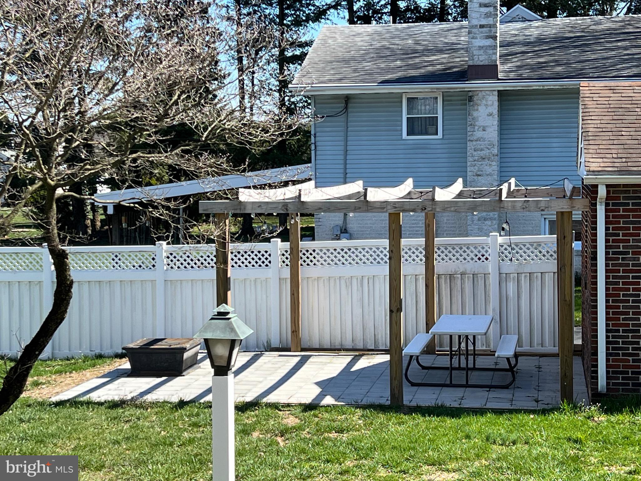 411 Parkside Avenue Reading, PA 19607 - Photo 7 of 19 Patio with pergola and firepit