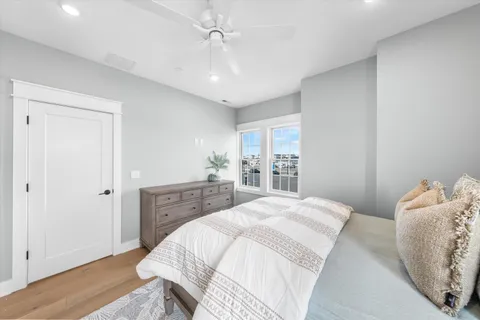 a view of roof deck with outdoor seating and city view