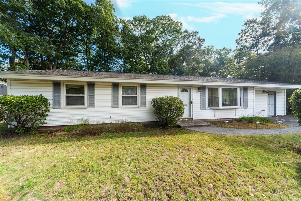 221 Sinclair Road Brockton, MA 02302 - Photo 2 of 26 a view of a house with backyard and garden