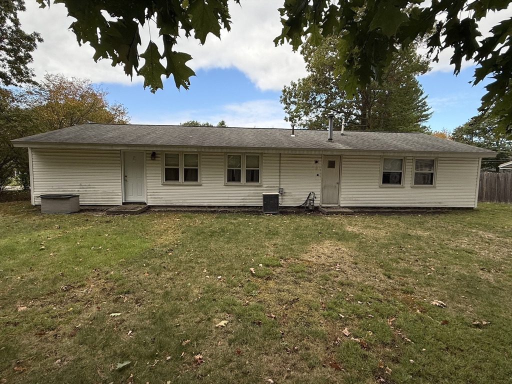221 Sinclair Road Brockton, MA 02302 - Photo 25 of 26 a front view of house with yard