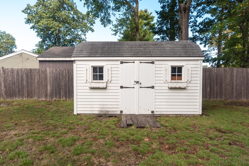 221 Sinclair Road Brockton, MA 02302 - Photo 26 of 26 a view of a house with a yard