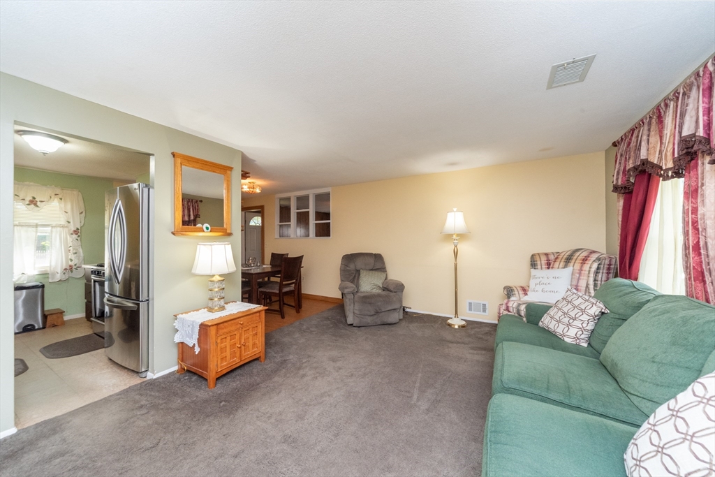 221 Sinclair Road Brockton, MA 02302 - Photo 5 of 26 a living room with furniture