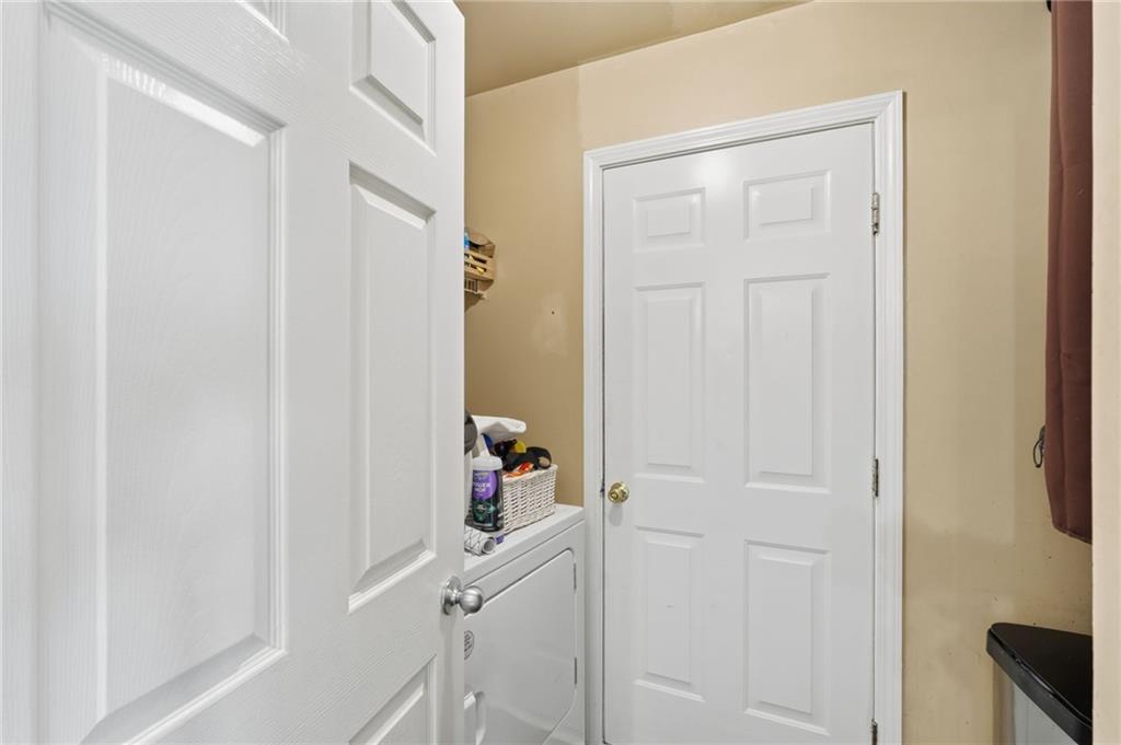 7140 Hunters Trace Drive Cumming, GA 30028 - Photo 19 of 35 a view of room that has a window and hardwood floor