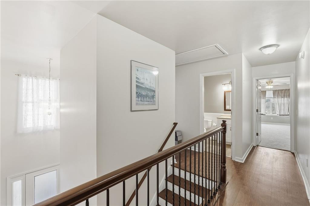 7140 Hunters Trace Drive Cumming, GA 30028 - Photo 20 of 35 a view of a hallway with windows