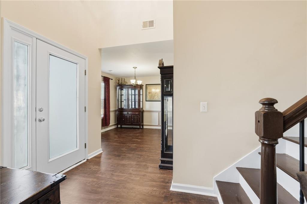 7140 Hunters Trace Drive Cumming, GA 30028 - Photo 6 of 35 a view of a hallway with a elevator