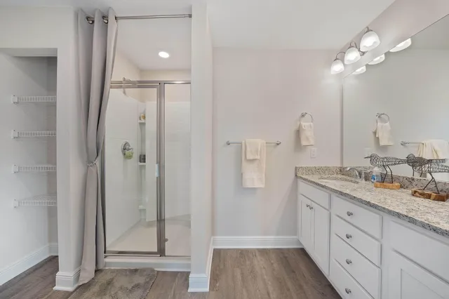 a view of an entryway with wooden floor